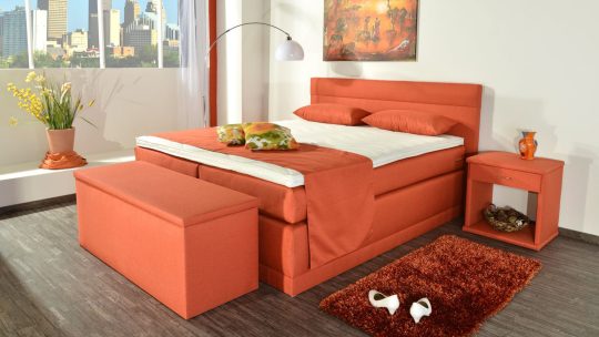 Boxspringbett Modell Bali, Polsterstoff Webstoff WT-Orange, Matratzenbezug in Bettfarbe, Ohne Füße mit optischer Sockelleiste